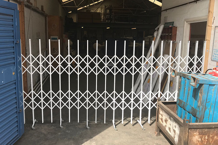 Expanding barrier in use - warehouse enterance